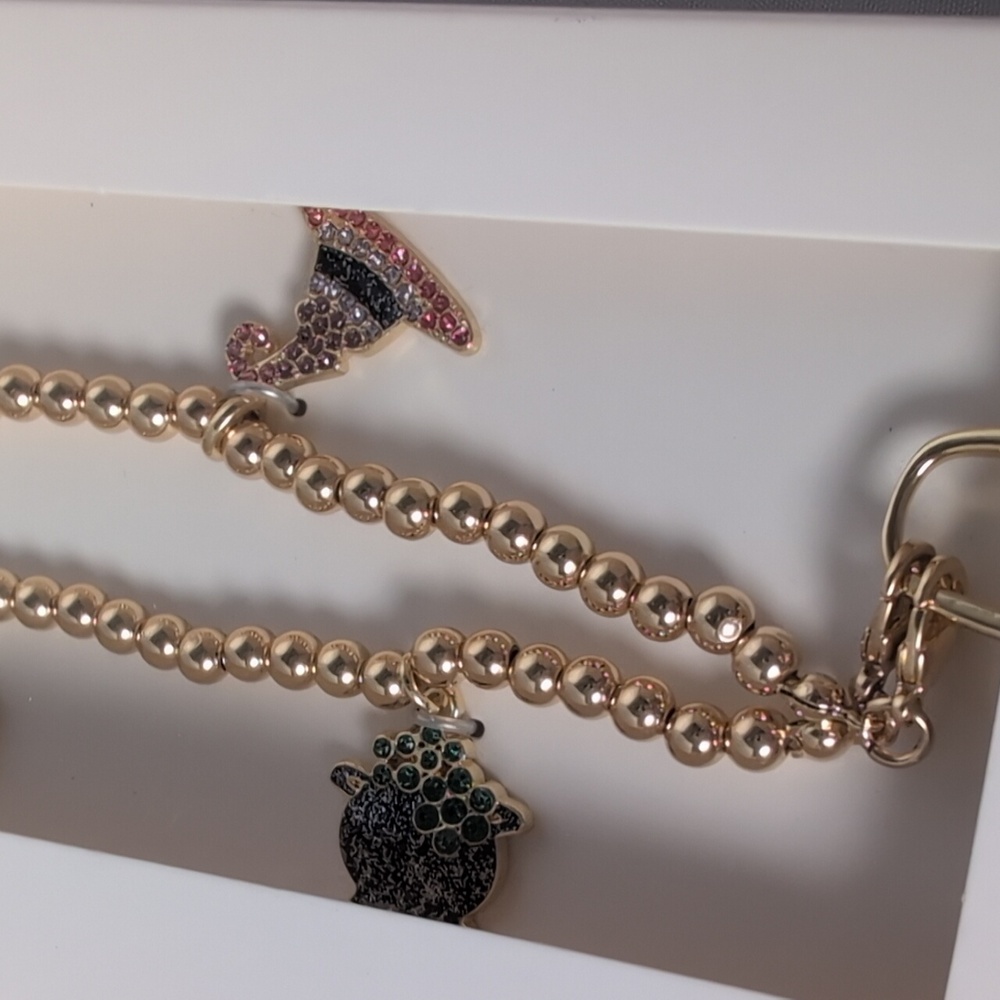 BaubleBar Halloween Themed Gold Tone Phone Charm Wristlet - Picture 3 of 7